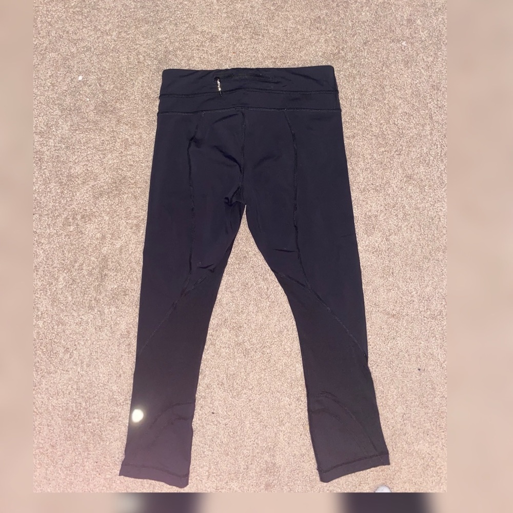 Size 4 lululemon mid-calf capri with mesh details